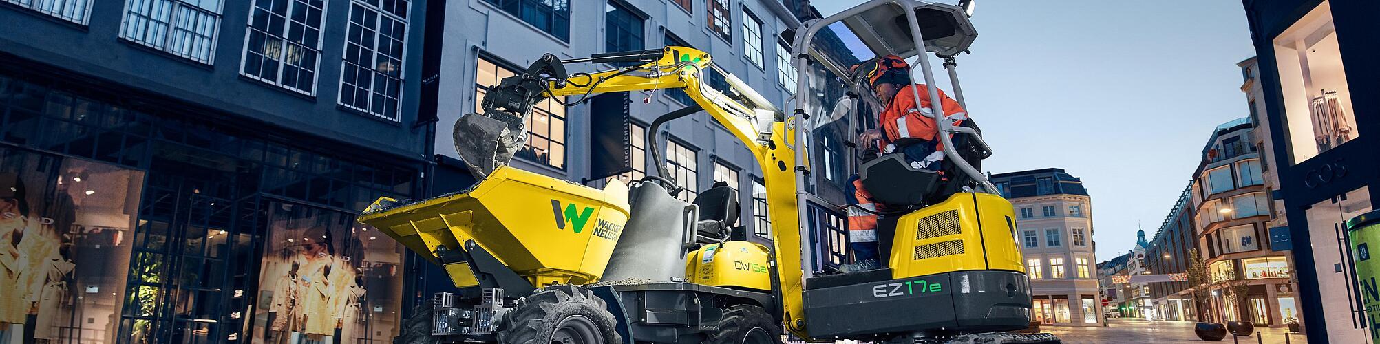 Wacker Neuson zero tail excavator EZ17e in application on a construction site in the city.