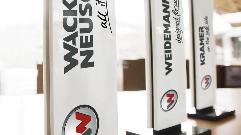 Les trois marques du Wacker Neuson Group : Wacker Neuson, Weidemann et Kramer.