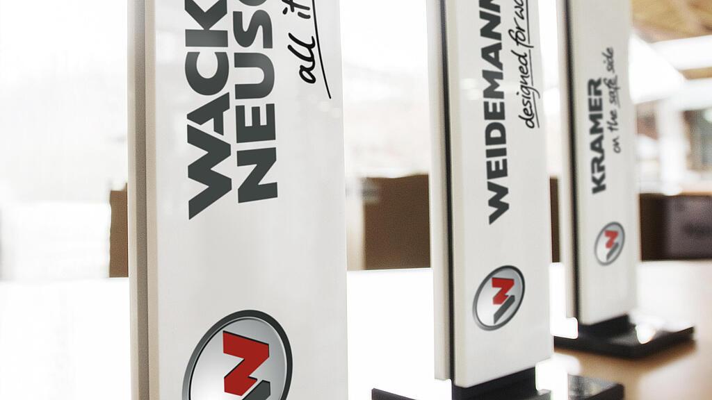 WN_EMEA_image_Displays_Brand_2717x3780px_02.jpg The three Wacker Neuson Group brands: Wacker Neuson, Weidemann and Kramer.